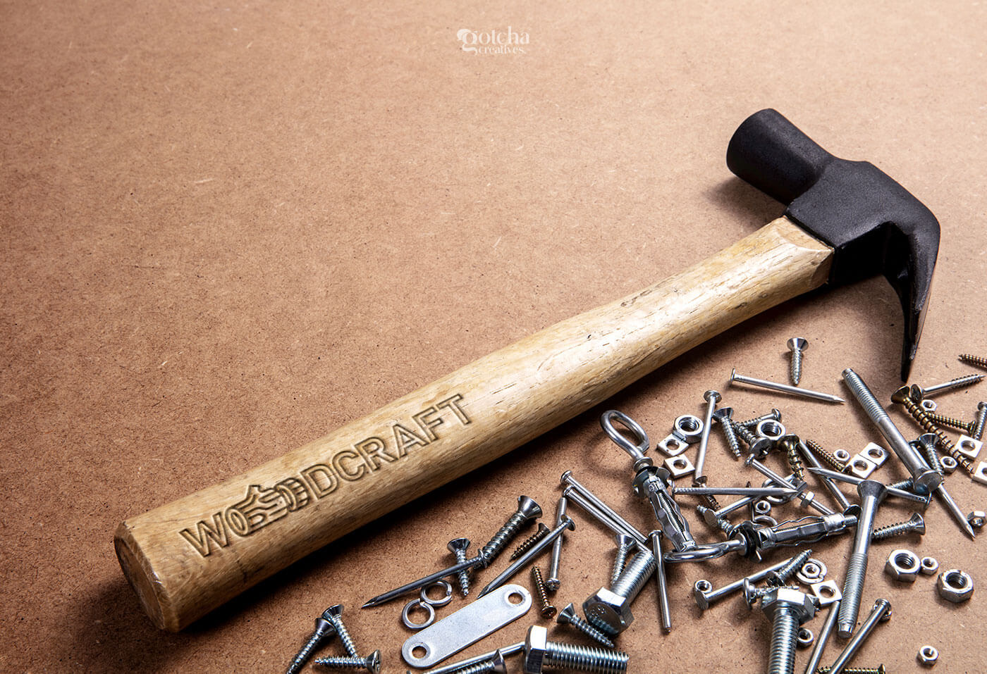 Indian wooden furniture brand logo featuring log illustration for WoodCraft