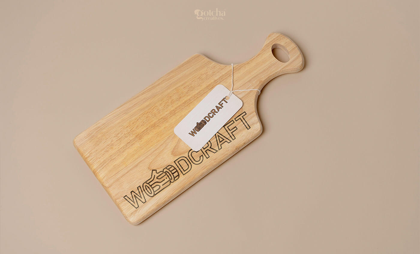 WoodCraft India furniture brand identity showing woodgrain background and log graphic