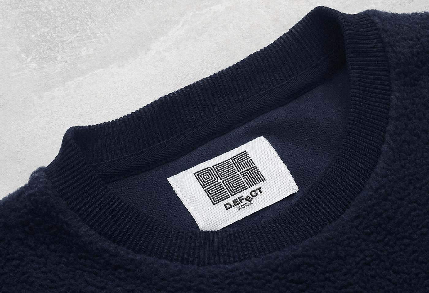 Modern minimalist D.EFECT logo with maze inspired letter patterns